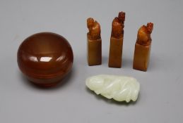 A Chinese pale celadon jade figure, a chalcedony box and cover and three soapstone seals