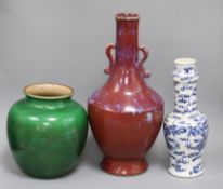 A Chinese flambe two handled vase, a green crackle-glazed jar and a blue and white vase tallest 40.