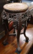 A late 19th century Chinese carved hardwood jardiniere stand with marble top W.35cm