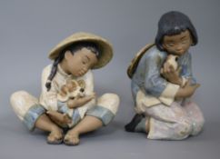 A Lladro Chinese boy 'Boys BEST Friend' and Chinese girl 'Friendly Sparrow' tallest 22cm