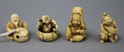 Two Japanese ivory netsuke of old men and two ivory okimono of immortals, late 19th/early 20th