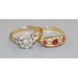 Two early 20th century 18ct gold and gem set ring including diamond cluster.