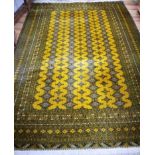 A mustard ground carpet 330 x 220cm