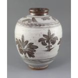 Malcolm Pepper (1937-80). A stoneware studio vase, with brown plant motifs on a cream ground,