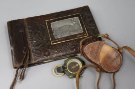 A World War I cased compass and a photo album