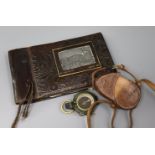 A World War I cased compass and a photo album