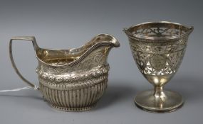 A George III demi fluted silver cream jug, London, 1809? and a George III pierced silver sugar