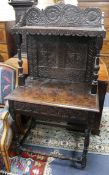 A 17th century style carved oak whatnot W.76cm