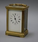 A gilt brass carriage timepiece