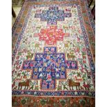 A Persian nomadic geometric animal design rug 290 x 197cm