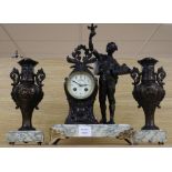 A late 19th century French bronzed spelter figural three piece clock garniture, on marble plinths