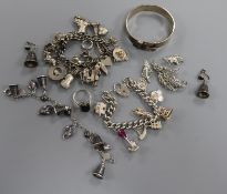 Two silver charm bracelets, a silver bangle, a silver and niello bracelet and earrings, marcasite