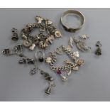 Two silver charm bracelets, a silver bangle, a silver and niello bracelet and earrings, marcasite