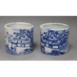 A pair of late 19th century Chinese blue and white brush pots height 11cm