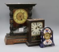 A late 19th century German eight day mantel timepiece in an ebonised and walnut case and two other