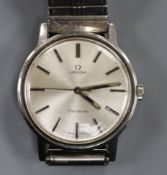 A gentleman's stainless steel Omega manual wind wrist watch.