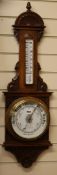 An oak aneroid barometer