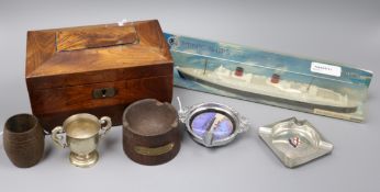 A group of mixed collectables, including a small two-division tea caddy, a Minic model of RMS