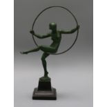 A small spelter figure of a hoop girl, signed Briand overall height 30cm