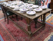 A 17th century style oak refectory table (made up) W.242cm