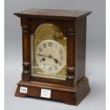 A late 19th century German oak cased eight mantel clock height 33.5cm