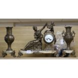 A late 19th century French gilt spelter figural three piece clock garniture, the eight day oak clock