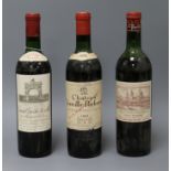 A bottle of Grand Vin De Leoville St Julien Medoc 1966, a bottle of Cos D'Estournel St Estephe