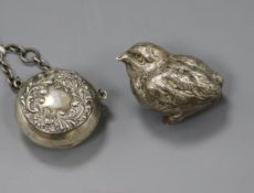 A Victorian novelty silver pepper pot, in the form of a wren, London, 1881 and an Edwardian silver