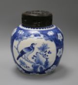 A Chinese blue and white prunus jar, wood cover, 19th century overall height 24cm