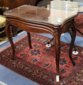 A 19th century mahogany card table, with folding serpentine top, on cabriole legs W.84cm