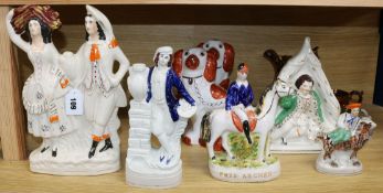 Five Staffordshire flatbacks, a pair of spaniels and two lustre jugs tallest 32cm