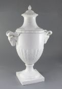 A large Furstenberg white glazed urn and cover, late 19th/early 20th century, of neo-classical form,