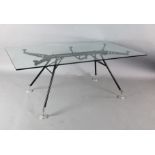 A Norman Foster for Tecno 'Nomos' glass top table, W.5ft 11in. D.2ft 11.5in. H.2ft 3in.