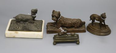 A bronze model of a mastiff, two other figures of dogs and a spelter model of a goat after P J