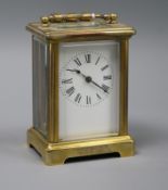 A late 19th century French brass cased eight day carriage timepiece height 35cm