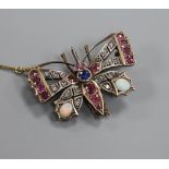 A Victorian yellow metal and multi gem set bug brooch, 40mm.