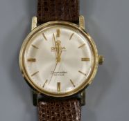 A gentleman's gold plated Omega Seamaster De Ville automatic mid-size wrist watch.