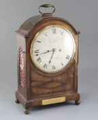 George Fowley of Doncaster. A Regency mahogany bracket clock, with arched cased and painted circular