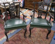 A set of six Chippendale Revival mahogany dining chairs with green leather seats (2 with arms)