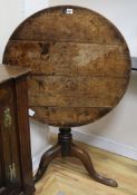 A George III oak tripod table W.73cm