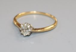 A yellow metal and solitaire diamond ring, size L.