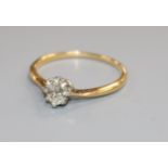 A yellow metal and solitaire diamond ring, size L.