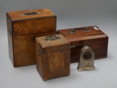 A George III tea caddy, a Victorian decanter box, a carriage clock case and a silver watch frame (