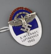 An NSFK enamel badge