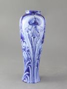 A Moorcroft Macintyre Florian ware tall baluster vase, in blue iris design, green signature W.