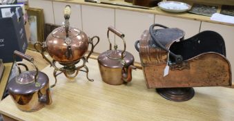 A collection of Victorian copperware, consisting of two kettles, a spirit kettle on stand and a coal