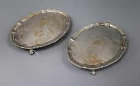 A pair of George III oval silver teapot stands, John Schofield, London, 1778, 20.4cm, 17 oz.