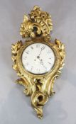J Eckstrom of Stockholm. A Swedish carved giltwood cartel clock, with painted dial, the case