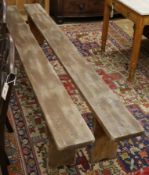 Two pine benches W.233cm & W.229