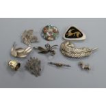 Two Danish sterling silver brooches, a cased enamelled thimble and seven other assorted silver